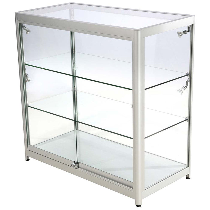 Glasvitrine Duo ohne Schrank in Silber mit LED-Spots, leicht schräge Ansicht